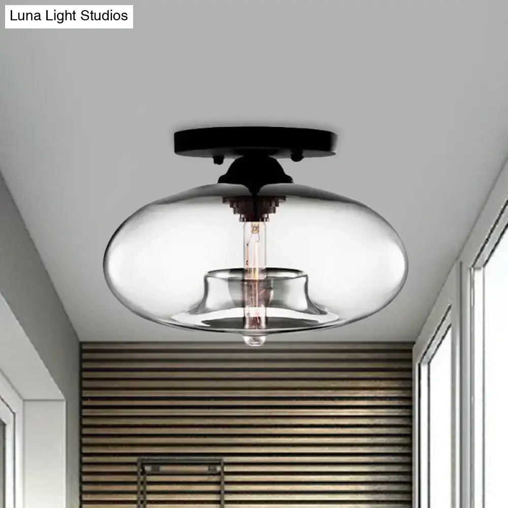 Decorbites simple style glass oval flush mount lamp with black metal base clear glass dome and exposed filament bulb
