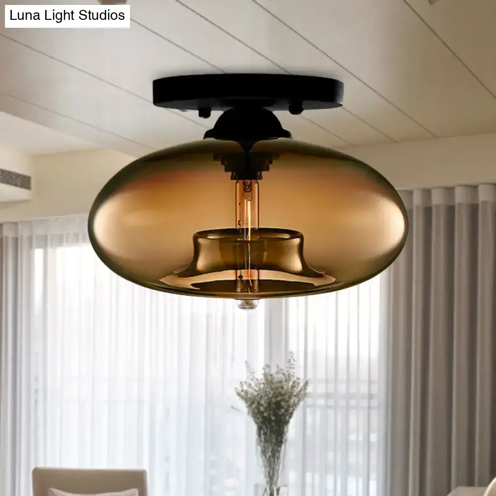 Decorbites simple style glass oval flush mount lamp with amber tint and black metal mount featuring edison bulb