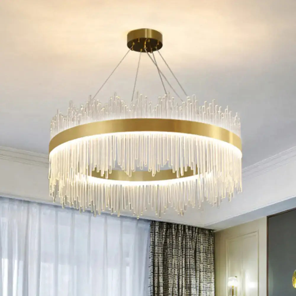 DecorBites™ simplicity gold LED crystal pendant light with a gold frame and cascading glass rods for living room use