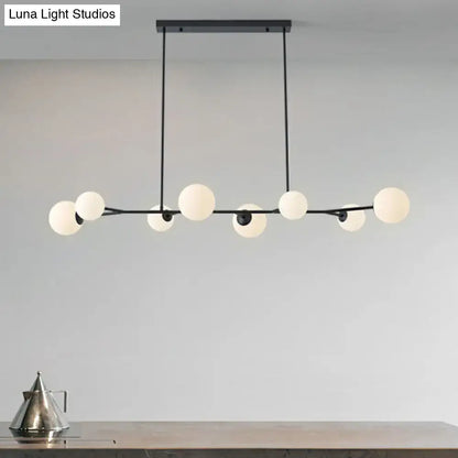 Modern black metal molecular island chandelier with frosted opal glass globes for dining rooms ceiling lighting