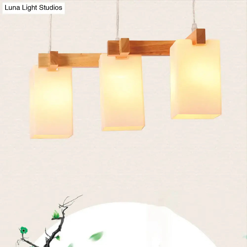 DecorBites™ simplicity wood 3-head island pendant light with opaline glass shades and adjustable chain cord length