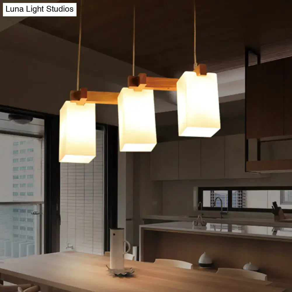 DecorBites™ Simplicity Wood 3-head pendant light with opaline glass shades and adjustable chain cord length