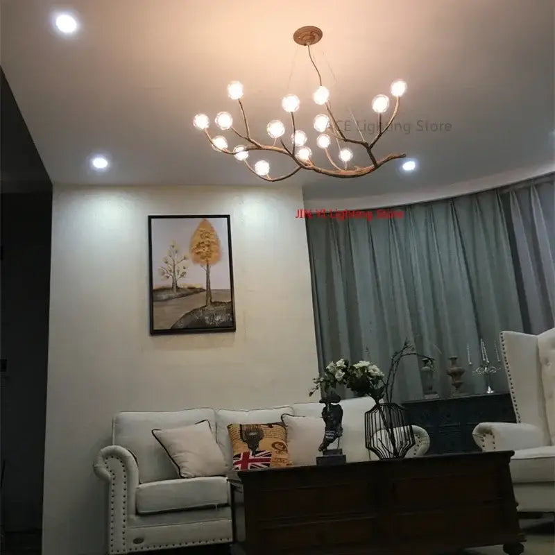 Bronze-colored decorbites™ simulation iron tree branch bubble chandelier with multiple spherical bulbs and iron tree design