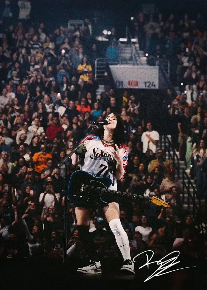 A signed canvas art print of singer b-billies performing in a white and blue 76ers jersey with a black electric guitar
