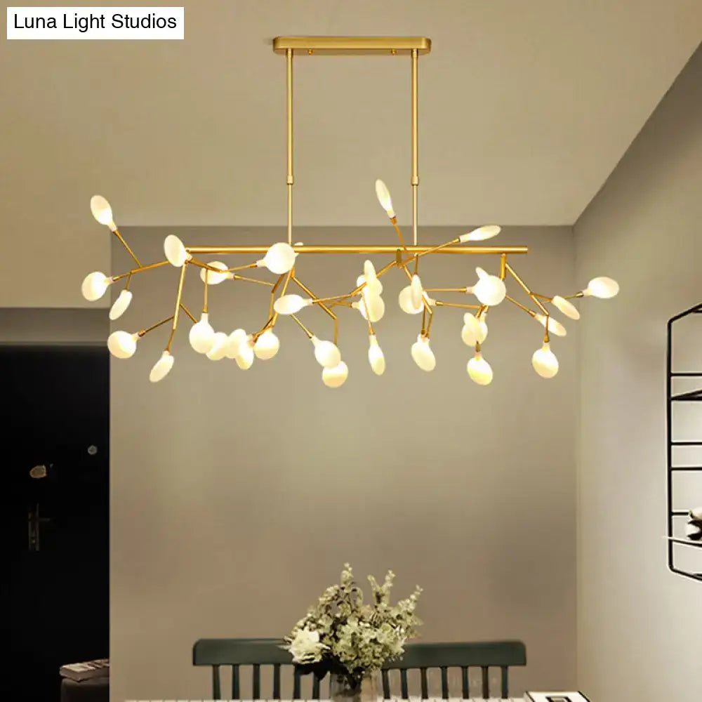 Gold-toned DecorBites™ sleek firefly LED dining room pendant light with opal glass globes and cast iron accents