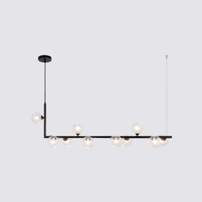 Modern black metal pendant light with clear glass globe bulbs for dining room hanging island by DecorBites™