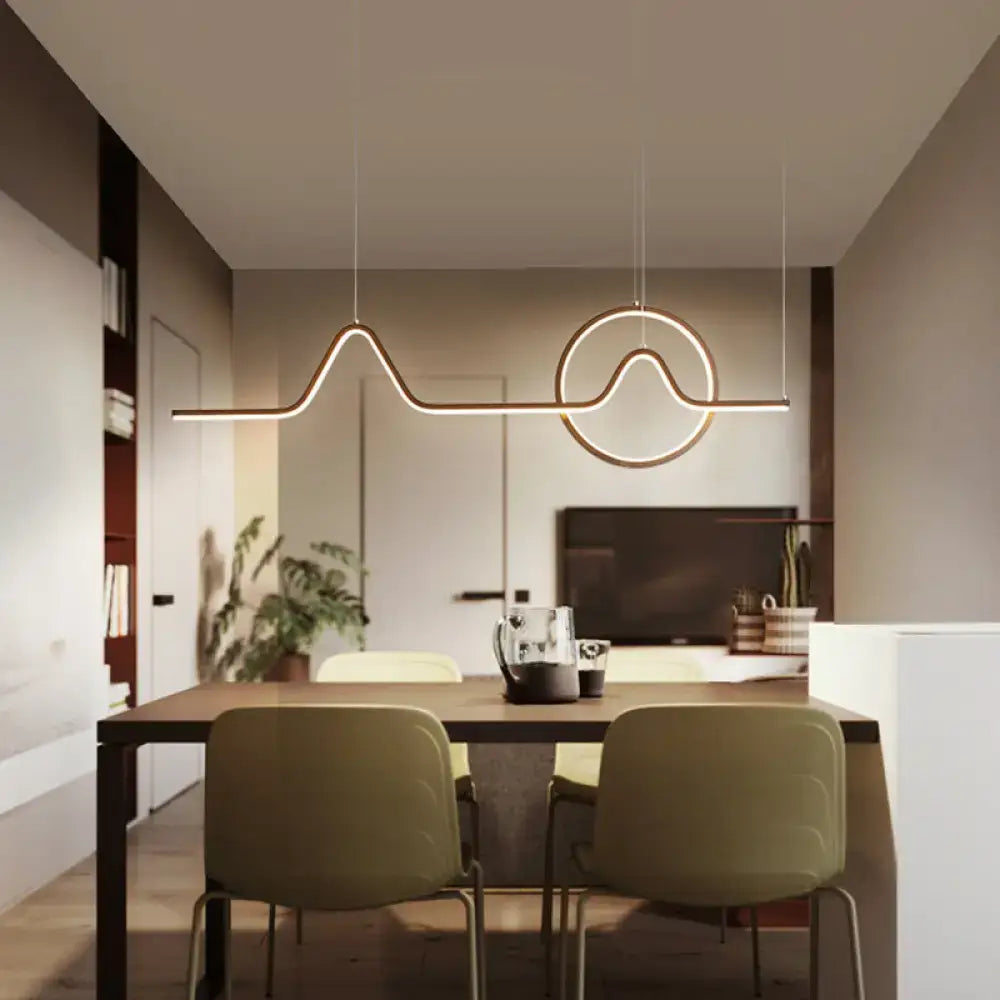 DecorBites™ sleek island light fixture in black gold with abstract wave design and metallic suspension for living room