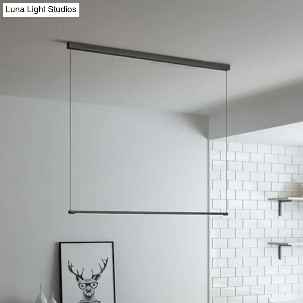 Modern black minimalist metal led island lamp with sleek linear design and thin cables for stylish island table