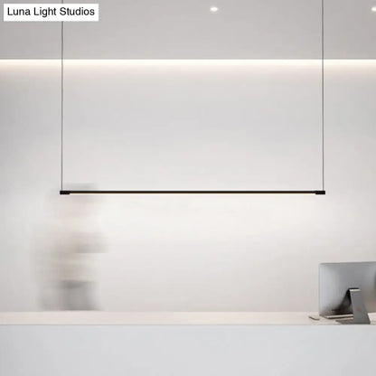 Minimalist black linear led island lamp with sleek metal design for modern stylish island table lighting by decorbites