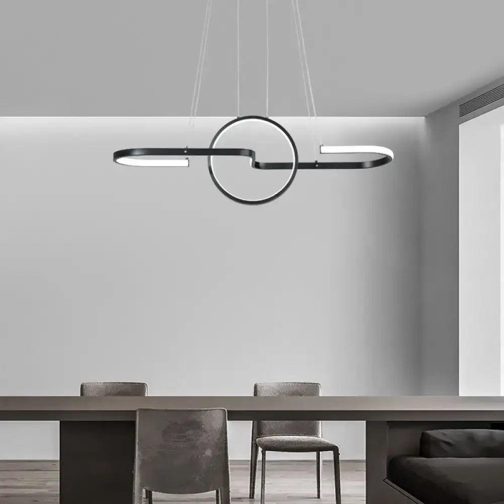 DecorBites™ sleek black metal pendant light with circular and curved LED elements for modern dining room use