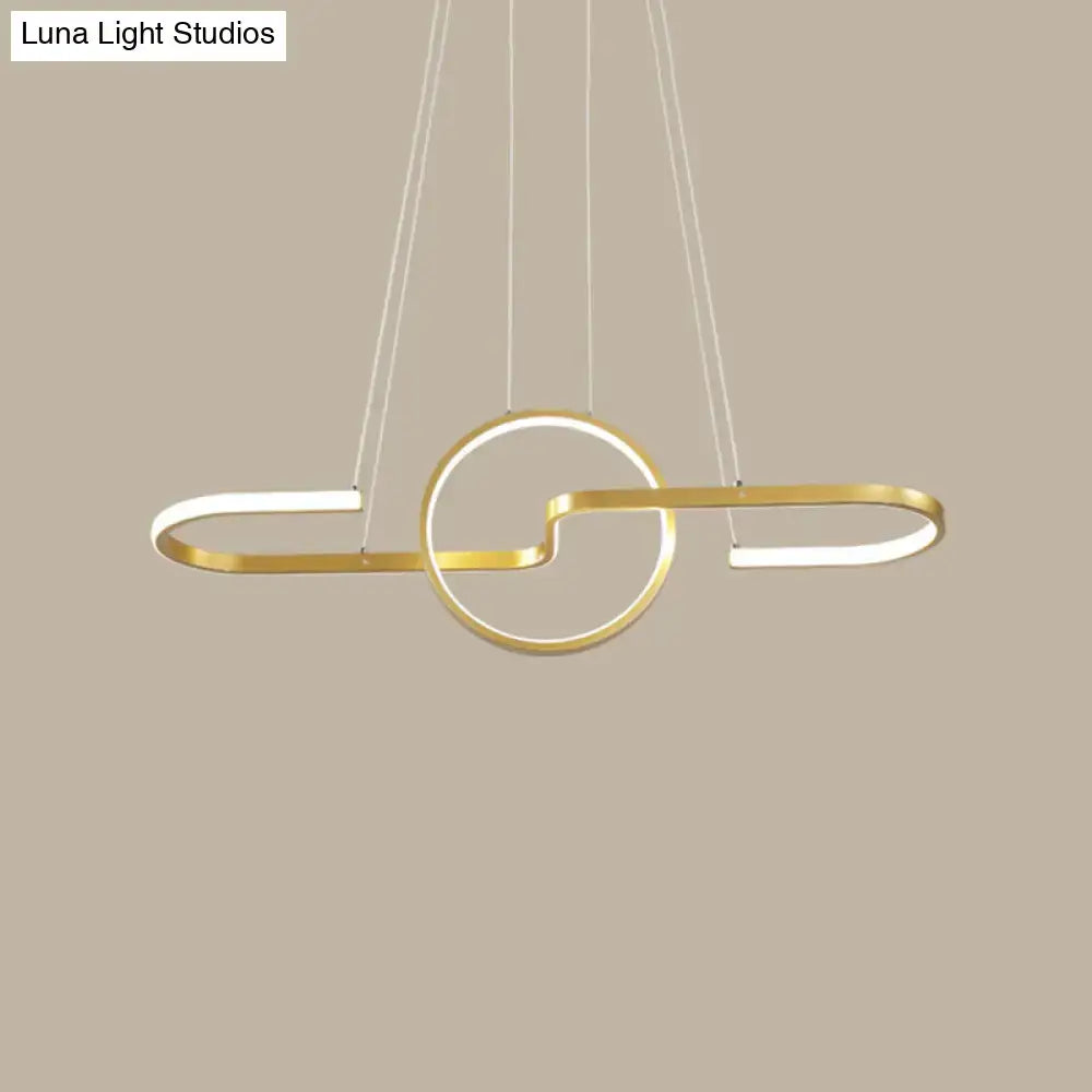 Modern gold-toned metal pendant light with sleek interlocking circular and oval led rings for curve dining room use