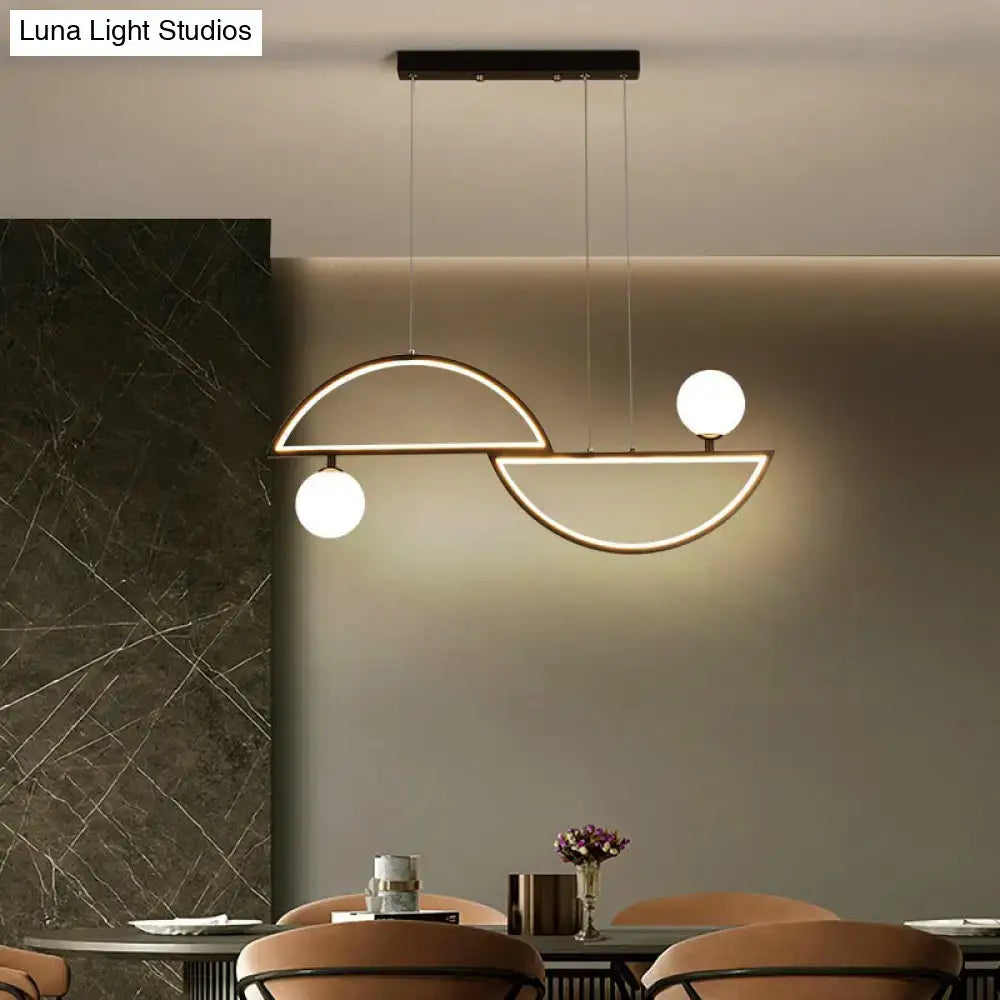 Decorbites sleek semi-circle island light fixture with black metal frame and two glowing opal glass bulbs ceiling light