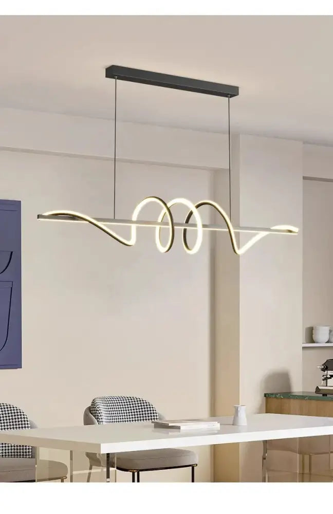 Modern minimalist decorbites sleek wavy pendant lights with black mount and gold coil design for dining room lighting