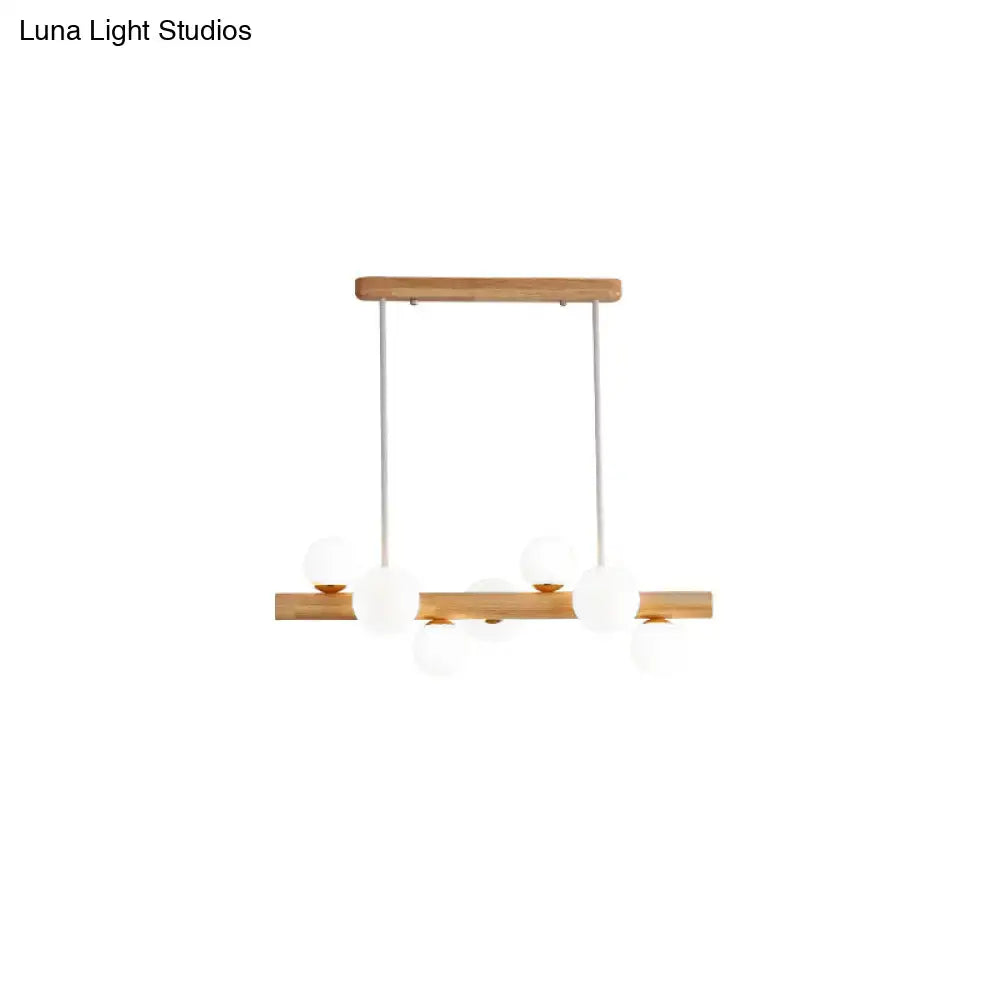 Decorbites sleek wooden ceiling light with cream glass shade and natural wood frame for modern dining room use