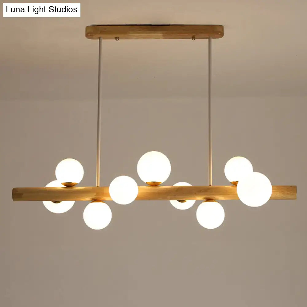 DecorBites sleek wooden ceiling light with cream glass shade and slender metal rods for modern dining room illumination