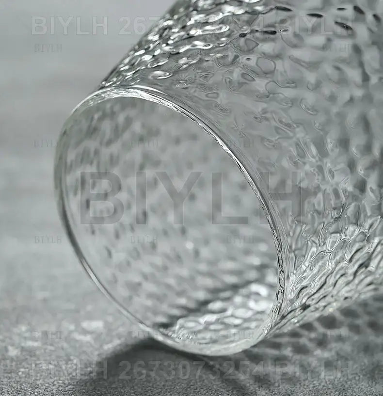 Decorbites small transparent glass vase with clear textured hammered surface for elegant home decor