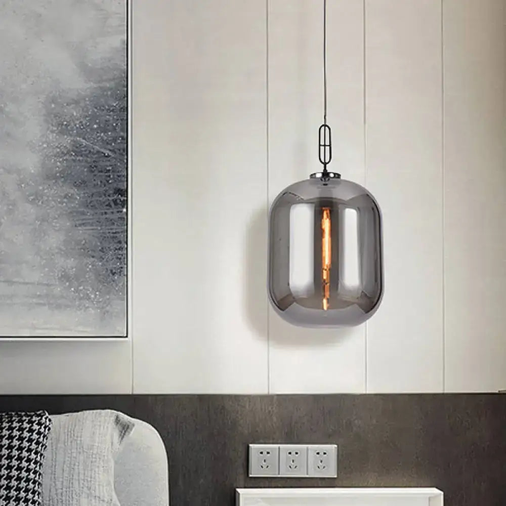 Decorbites™ smoke gray cognac glass pendant lamp with sleek smoked glass cylindrical design and visible filament bulb