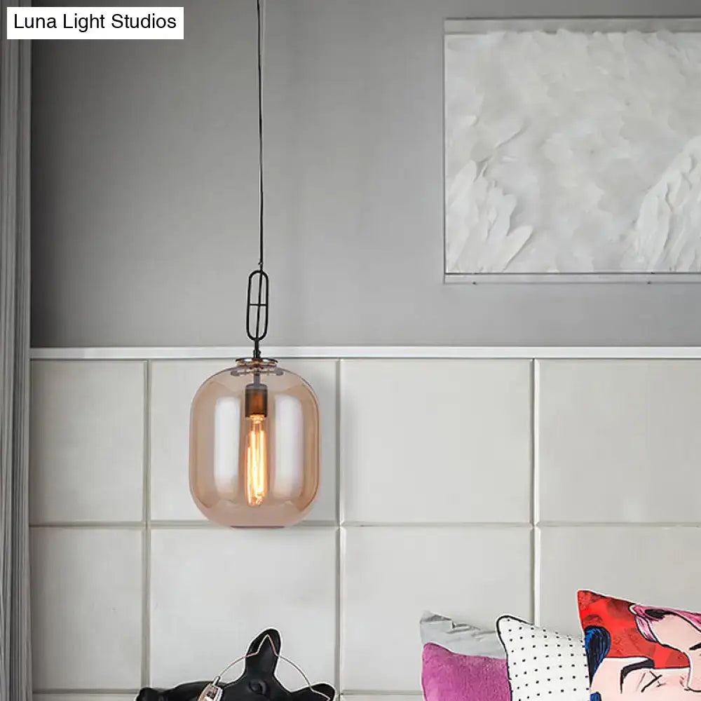 DecorBites™ warm-toned amber cognac glass pendant lamp with sleek black metal chain for industrial ceiling lighting