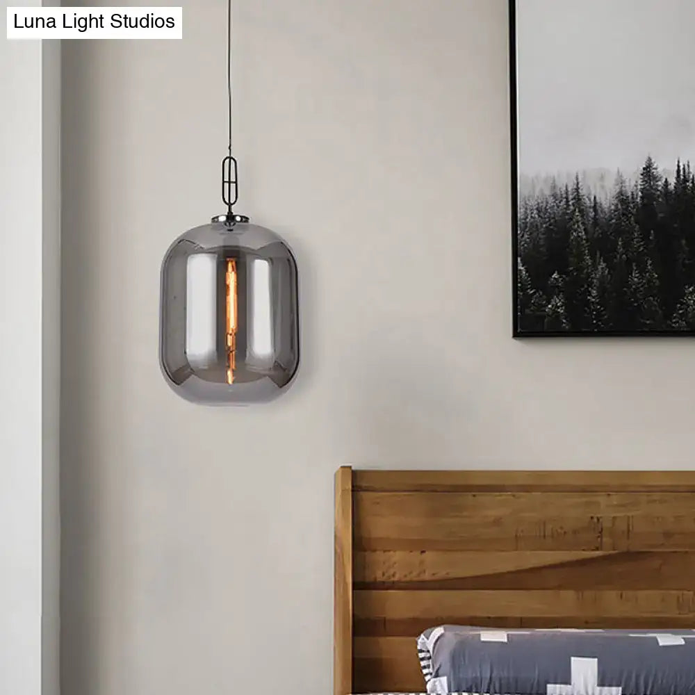 DecorBites smoke gray pendant lamp with cognac glass shade featuring a frosted cylindrical design and filament bulb