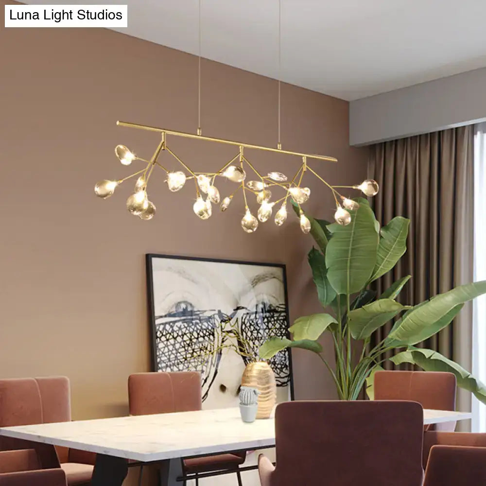 Gold-toned DecorBites™ smoke grey glass firefly chandelier with branching arms and clear teardrop globes for dining room