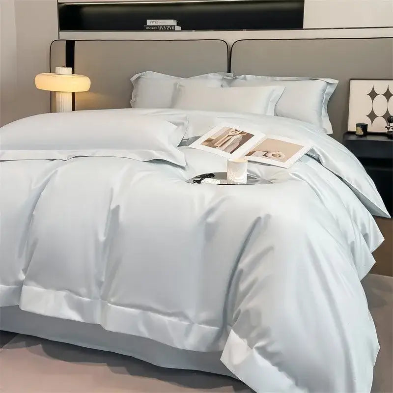 Decorbites soft egyptian cotton duvet cover set in light blue satin with stitched detailing and matching fitted sheet