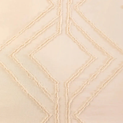 Cream-colored microfiber duvet cover set with textured geometric diamond embroidery in the DecorBites™ Soft Tufted collection