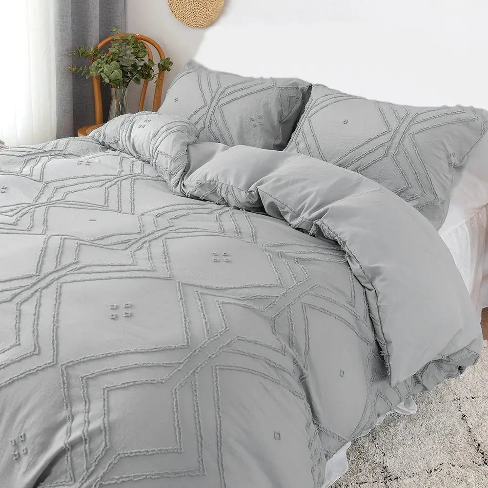 Gray quilted microfiber duvet cover set with geometric embroidery and ruffled edges from DecorBites™ cover set