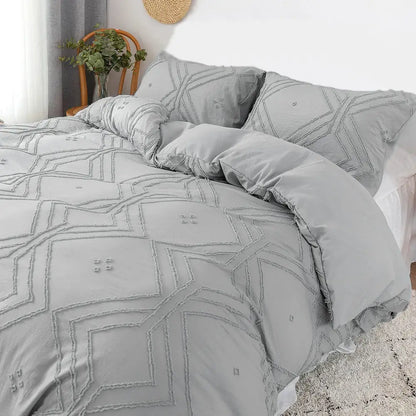 Gray quilted microfiber duvet cover set with geometric embroidery and ruffled edges from DecorBites™ cover set