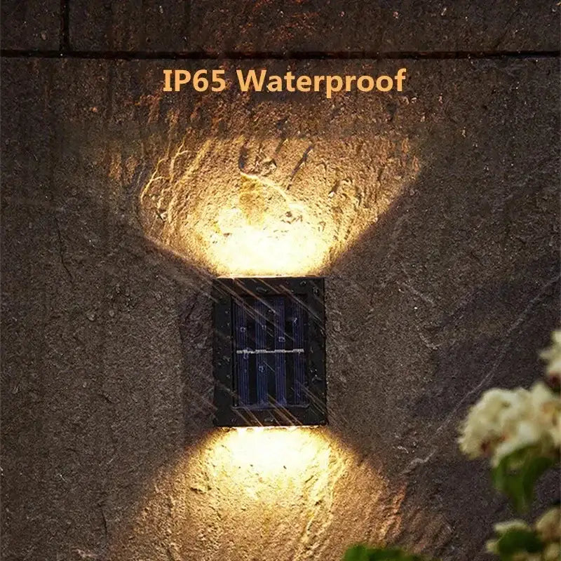 Black rectangular DecorBites™ solar led wall light with dual downward-facing lamp beads for outdoor use