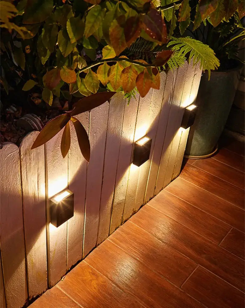 DecorBites™ solar led black square wall light with lamp beads providing warm focused outdoor illumination