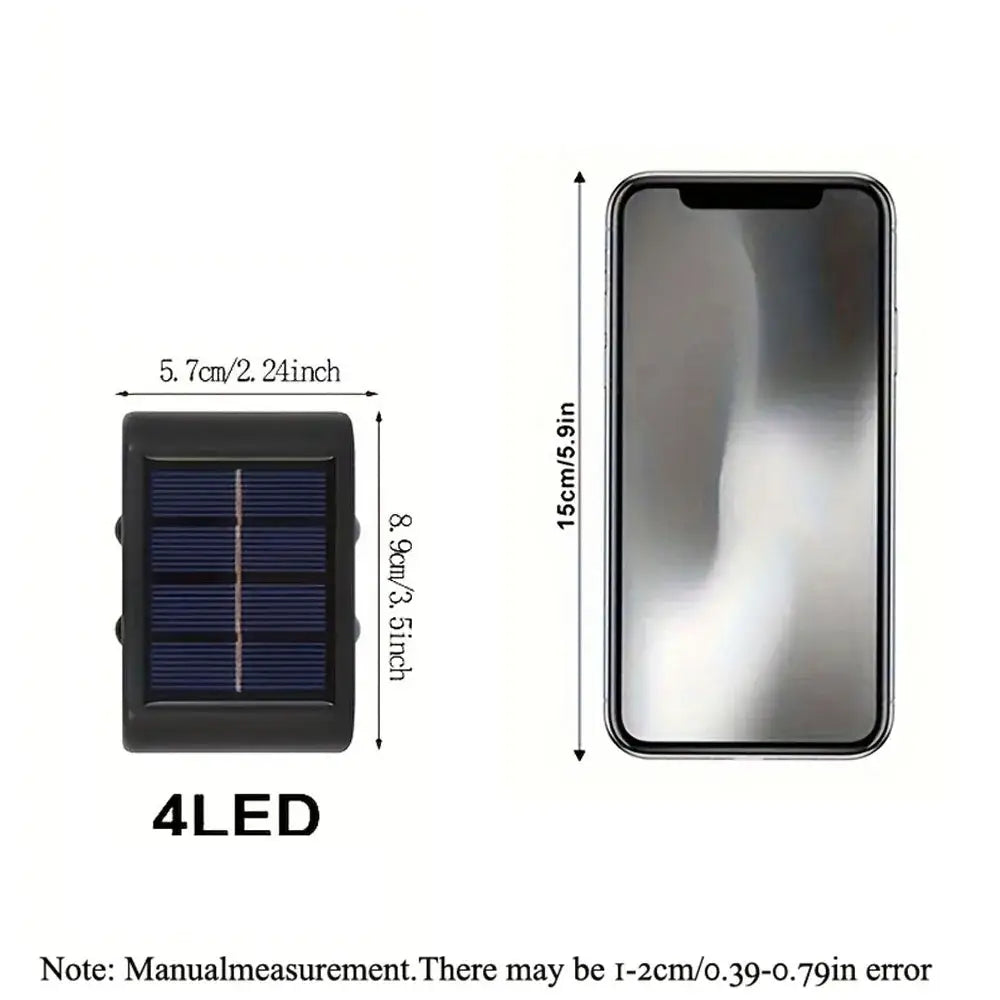 Black rectangular solar led outdoor wall light with four blue leds and sleek compact design for garden and patio use