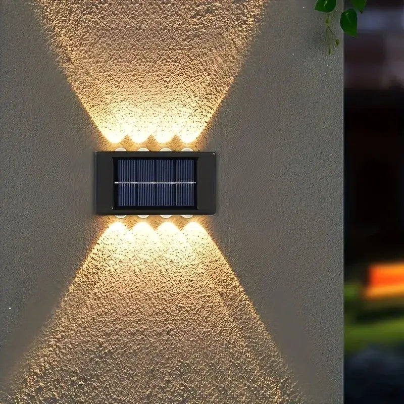 Decorbites™ black rectangular solar led outdoor wall lights with six warm white leds casting cross-shaped glow