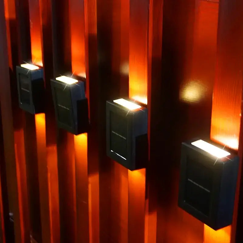 DecorBites™ black rectangular solar outdoor led lights with warm orange top illumination for garden decoration