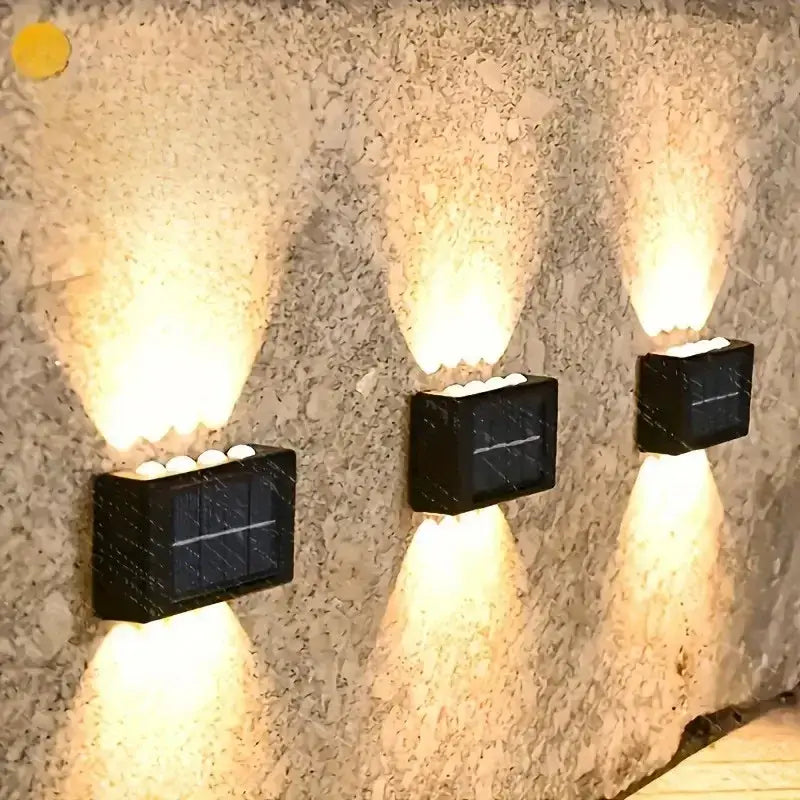 Decorbites™ black rectangular solar outdoor wall lights with integrated led bulbs casting warm focused beams
