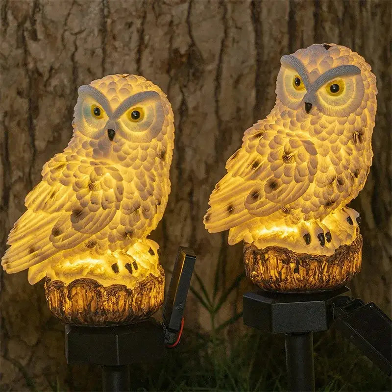 DecorBites™ solar owl garden light with textured feathers and yellow glowing eyes for decorative outdoor use