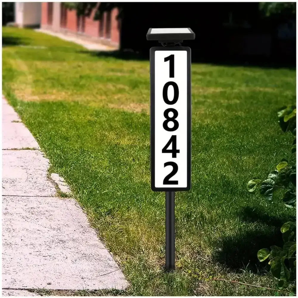 DecorBites™ black solar powered led house number marker with white panel displaying number 10842 in bold black font