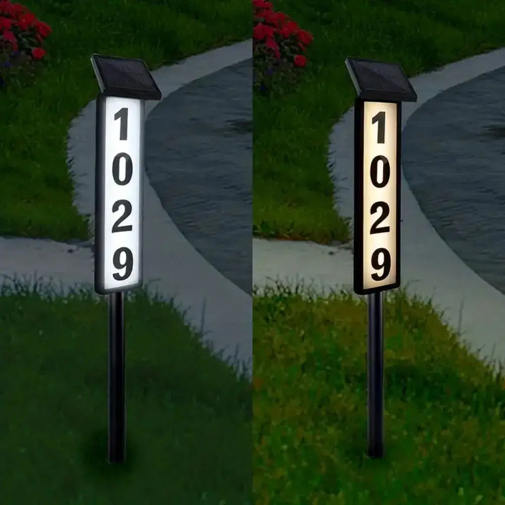 Decorbites™ solar powered led house number light with black solar powered panel and illuminated white backlit numbers 1029
