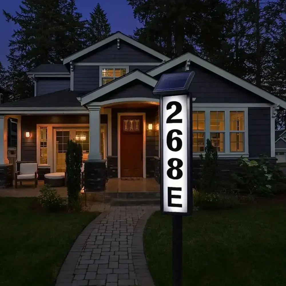 DecorBites™ solar powered led house number sign in black with illuminated white numbers displaying 268 e