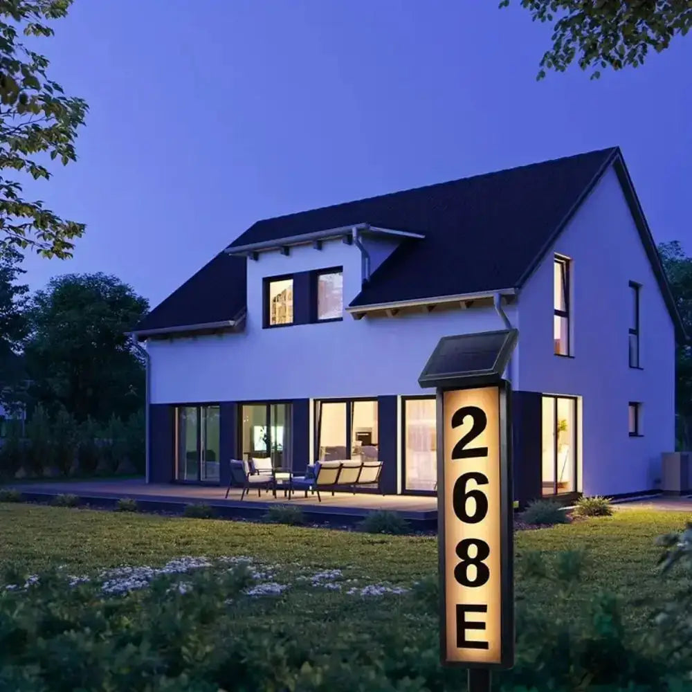 Decorbites™ solar powered led house number light with black frame and illuminated gold numbers for outdoor use