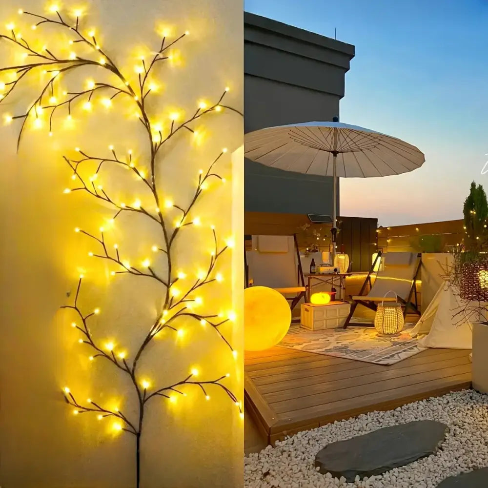 Warm yellow led lights strung along a black decorative branch in the decorbites solar willow vine light outdoor waterproof fairy light