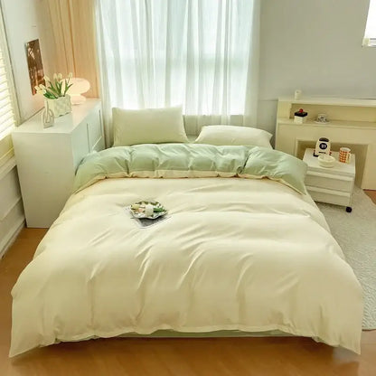 Cream-colored solid color duvet cover set with soft mint green accent panel made of brush fabric by decorbites