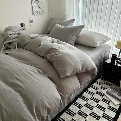 Decorbites solid cotton bedding set with soft gray duvet cover and matching pillows in various sizes