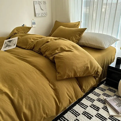 Warm mustard-colored DecorBites™ solid cotton bedding set with duvet cover and matching pillows in soft textured fabric