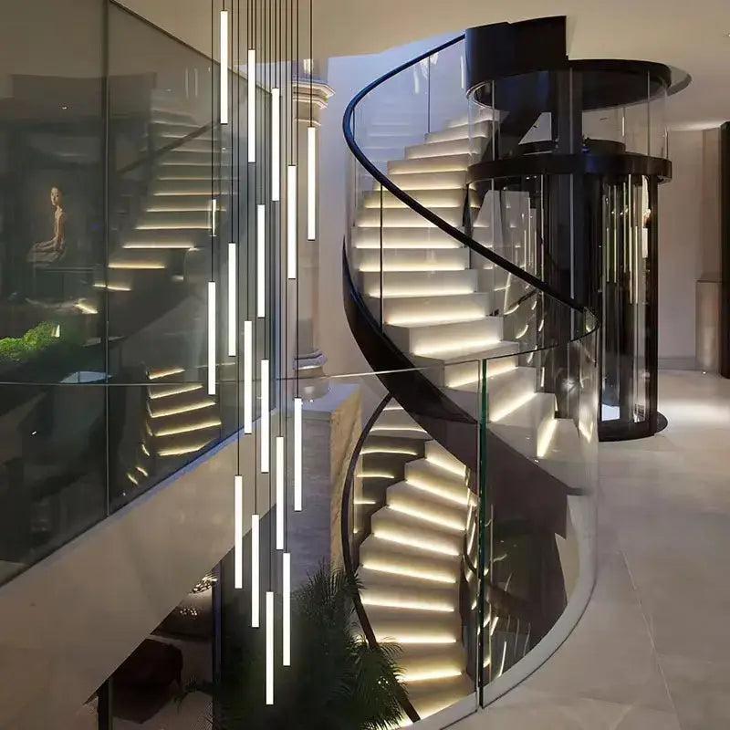 Modern ceiling chandelier with sleek black metal frame, transparent glass, and illuminated white spiral steps by decorbites
