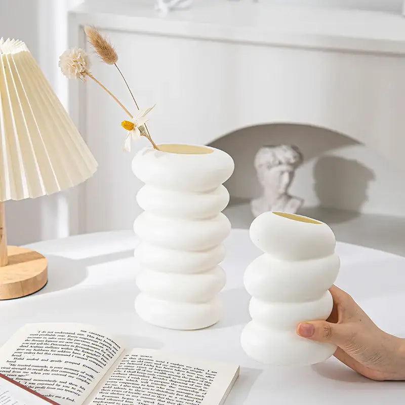 White ceramic decorbites spiral white vase with stacked rounded segments and smooth matte finish for home decoration