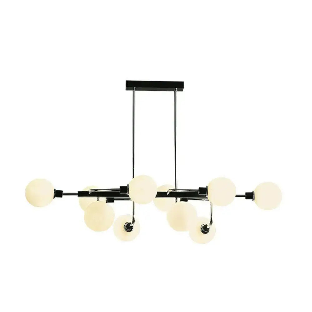 Modern black and chrome sputnik hanging island light with frosted glass globe lamps for dining room illumination