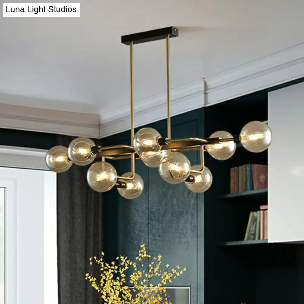 Gold-toned DecorBites™ sputnik hanging island light with glass ball bulbs for dining room minimalist pendant lighting