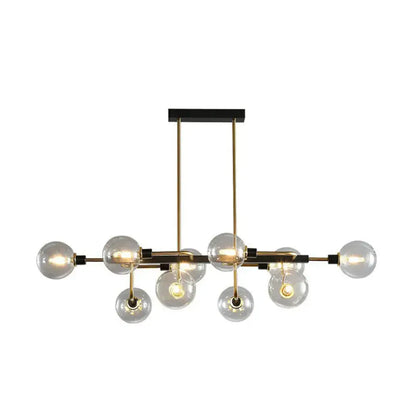 Modern brass and black sputnik hanging island light with clear glass globe bulbs for dining room decor