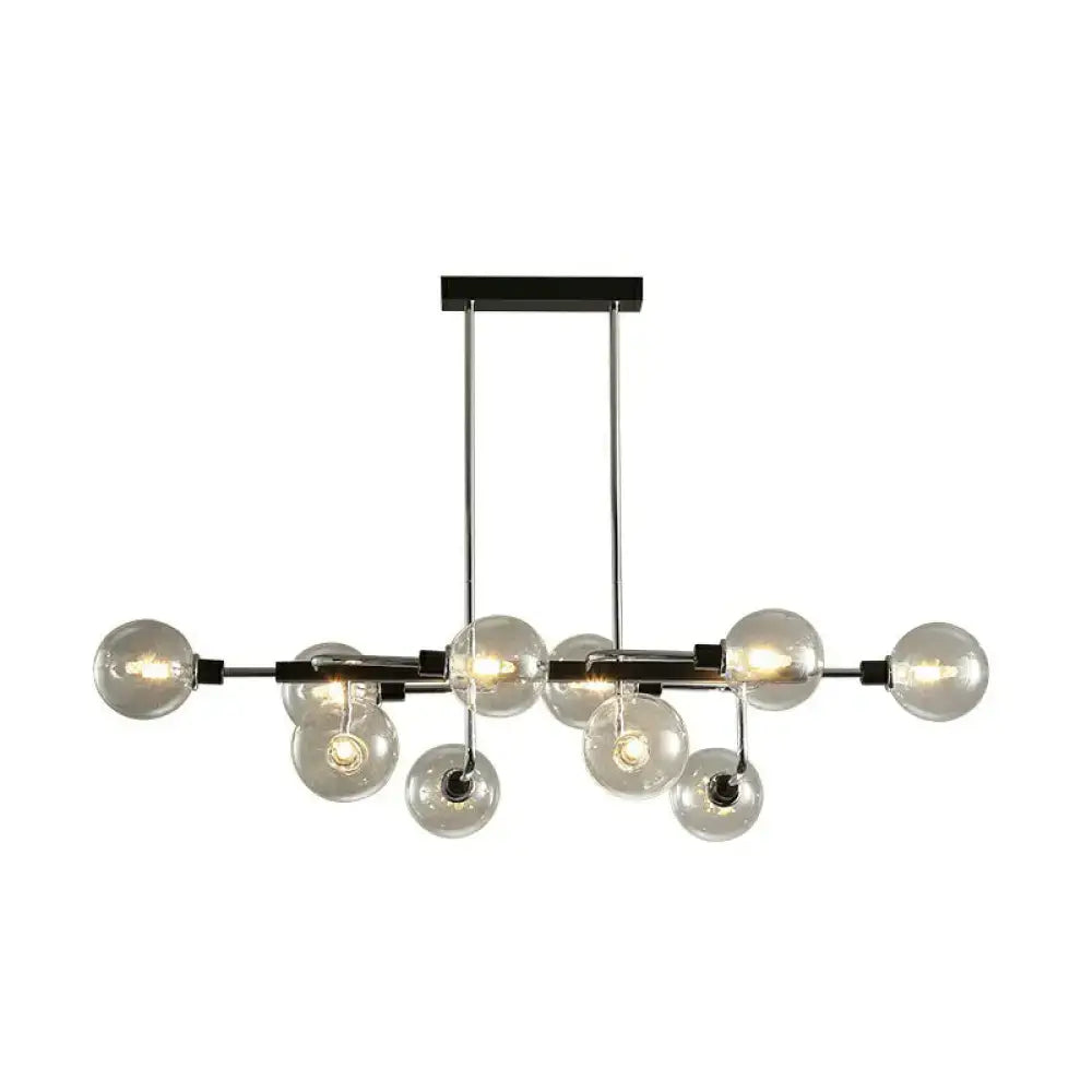 Modern black and chrome sputnik hanging island light with clear glass globes for dining room decor by DecorBites™