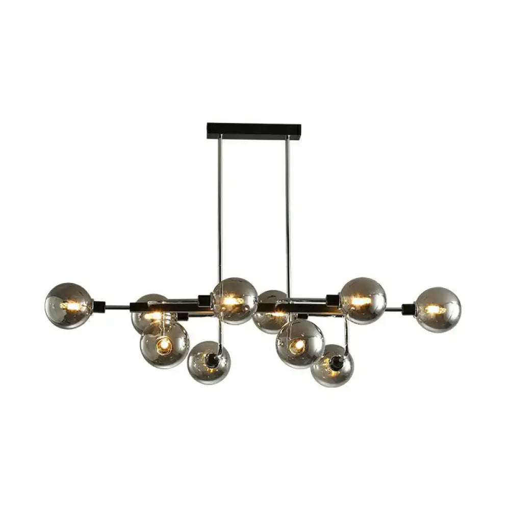 Modern chrome and black metal sputnik hanging island light with multiple glass globes for dining room illumination